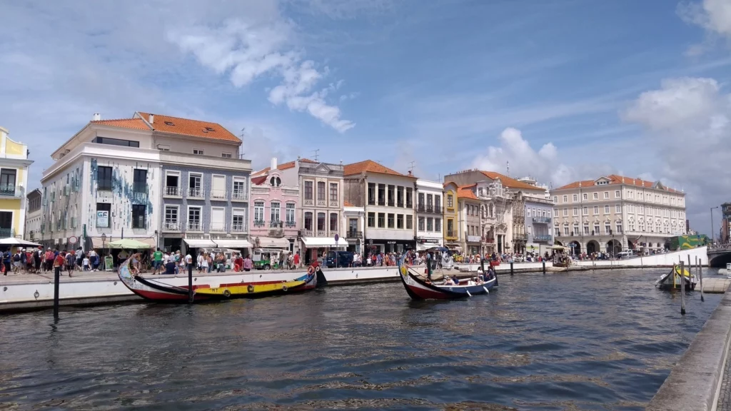 aveiro city center canals moliceiro boats venice portugal color romance wonders barco tourists atlantic ocean silver coast