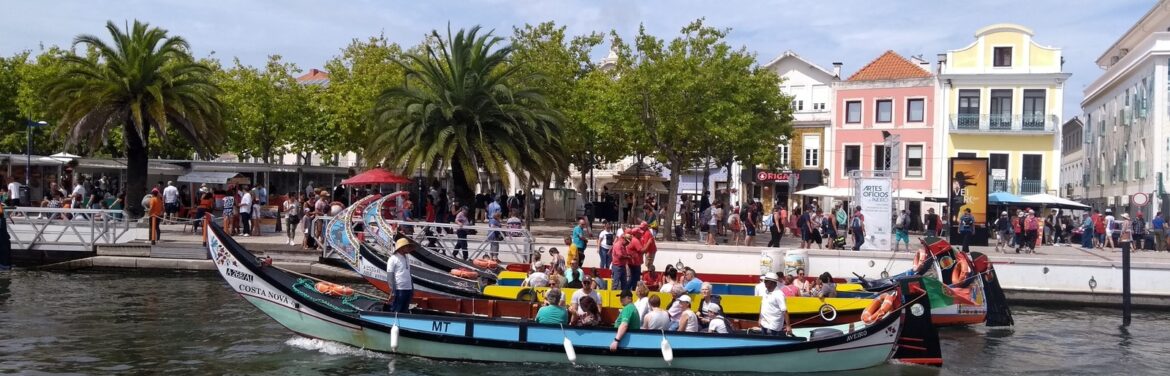 aveiro moliceiro boat tourists canal city center visit ria color wonder romance venice portugal