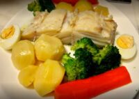 bacalhau most popular fish portugal dish cooked boiled cozido food gastronomy patatos aardappelen vegetables