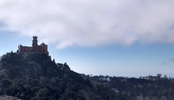 sintra as a royal summer residence palacio da pena palace mountain overview nature forest red color side